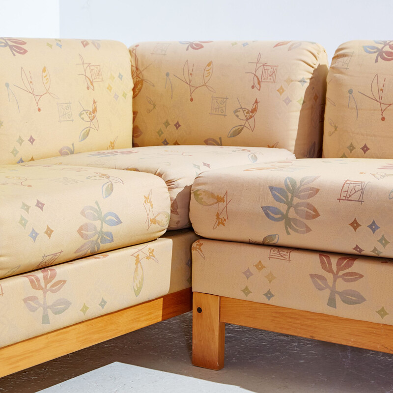 Canapé d'angle vintage en osier et coussins rembourrés