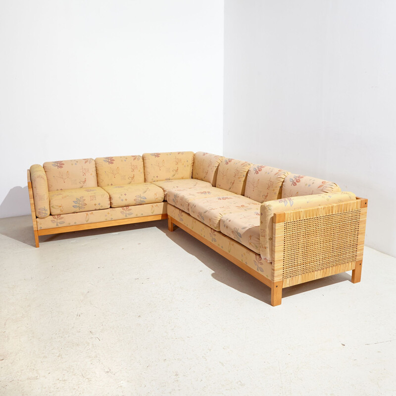 Vintage wicker and upholstered cushions corner sofa