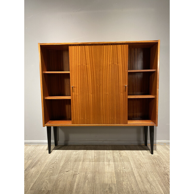 Vintage bookcase with sliding doors