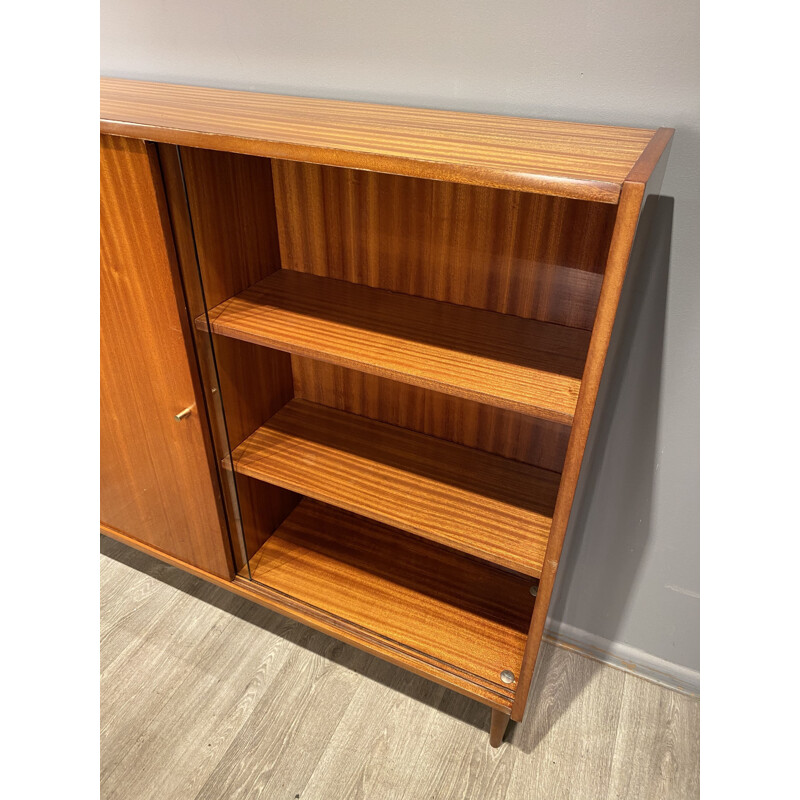 Vintage bookcase with sliding doors