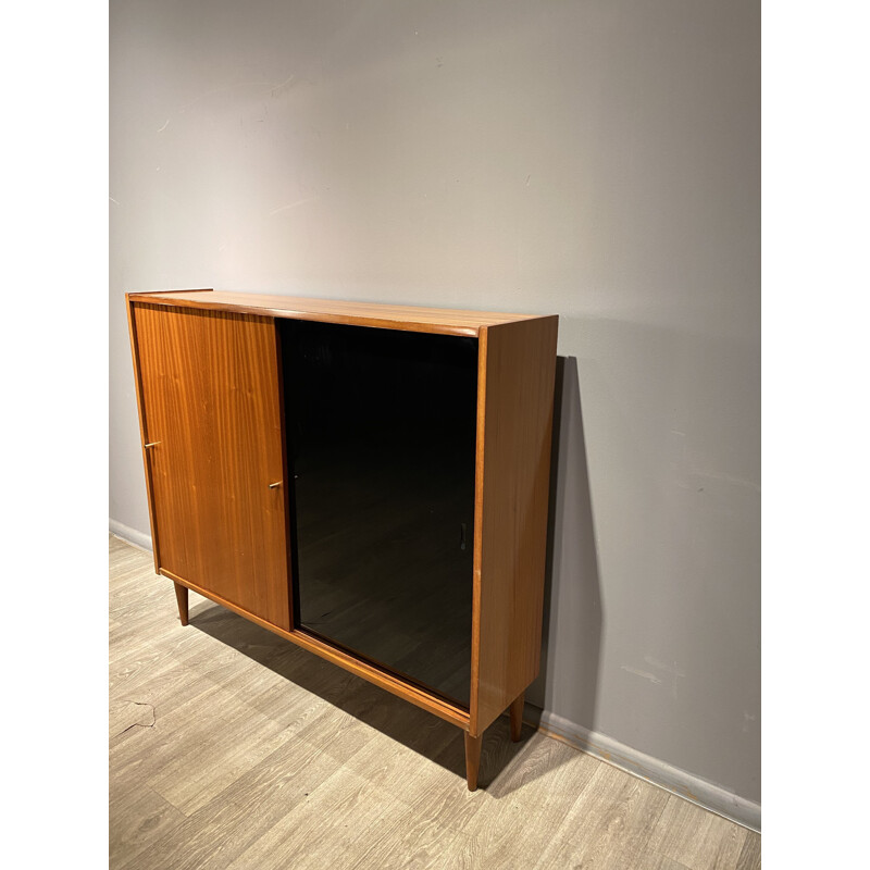 Vintage bookcase with sliding doors