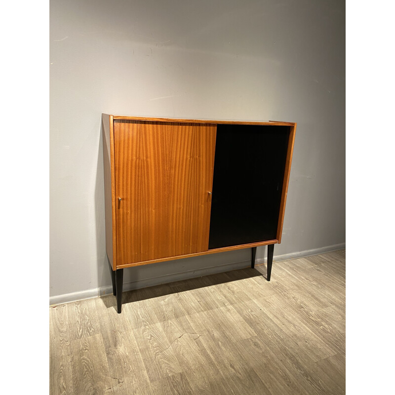 Vintage bookcase with sliding doors