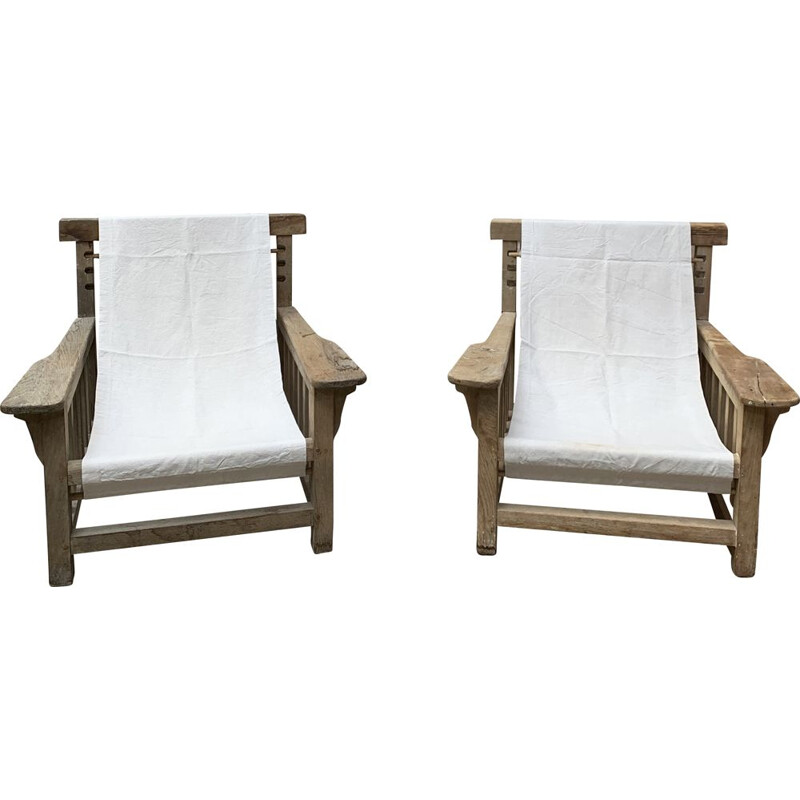 Pair of vintage oak and beige fabric "Hammock" armchairs by Robert Mallet-Stevens for Pierre Daniel Vers, 1925