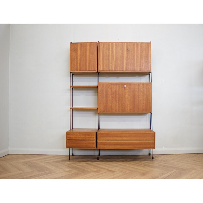 Mid century teak 7 pieces shelving unit by Hilker for Omnia, Germany 1960s
