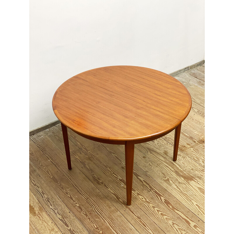 Round mid century teak extendable dining table by Sighs and Sons, Denmark 1960s