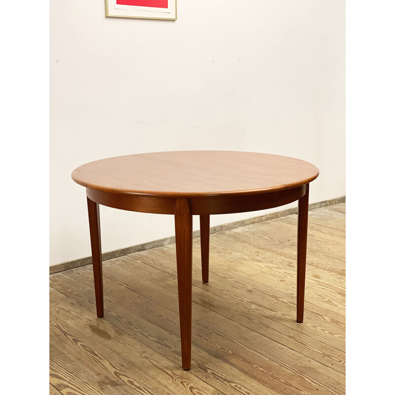 Round mid century teak extendable dining table by Sighs and Sons, Denmark 1960s