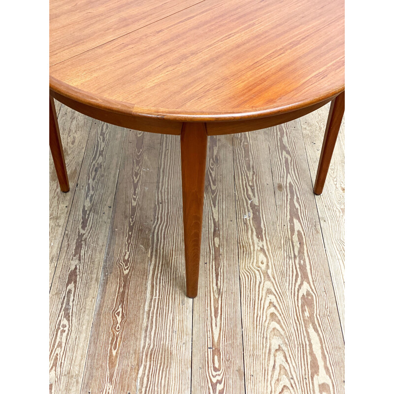 Round mid century teak extendable dining table by Sighs and Sons, Denmark 1960s