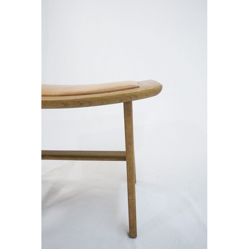 Vintage footstool in teak and oakwood with patinated brown leather by Peter Hvidt & Orla Mølgaard-Nielsen