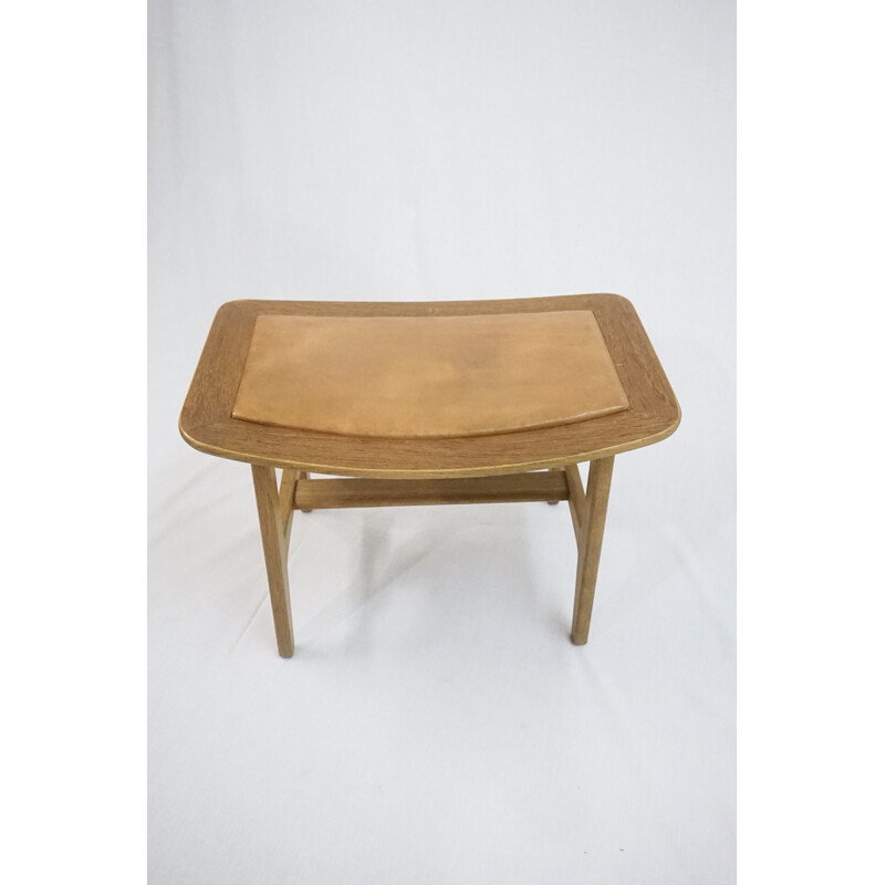 Vintage footstool in teak and oakwood with patinated brown leather by Peter Hvidt & Orla Mølgaard-Nielsen