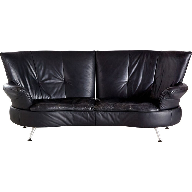 Two-seater black vintage leather sofa