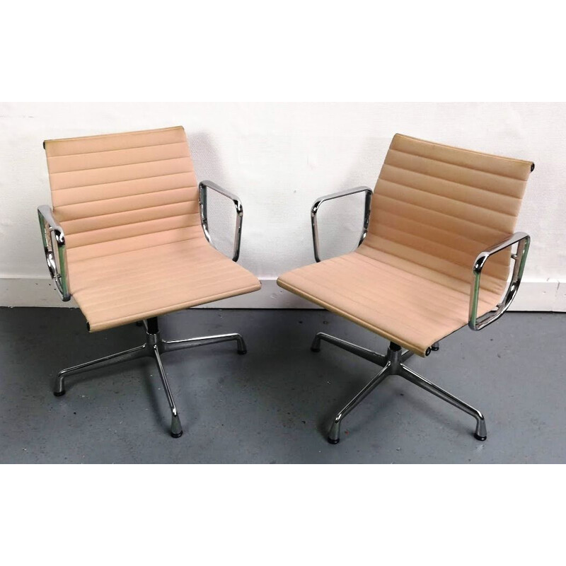 Vintage EA107 armchair with armrests by Charles & Ray Eames for Vitra