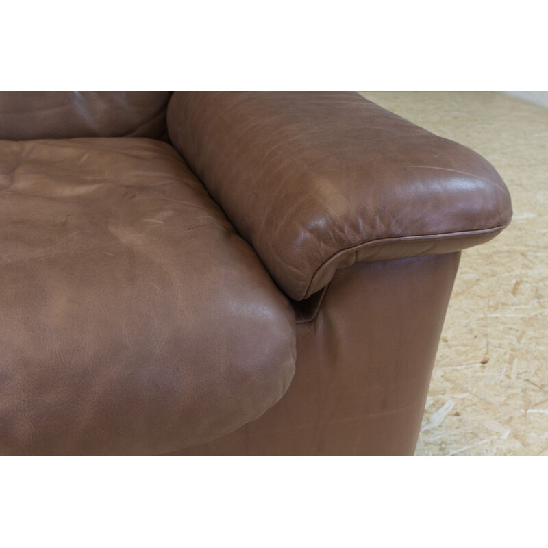 Set of vintage brown leather sofa and ottoman by De Sede
