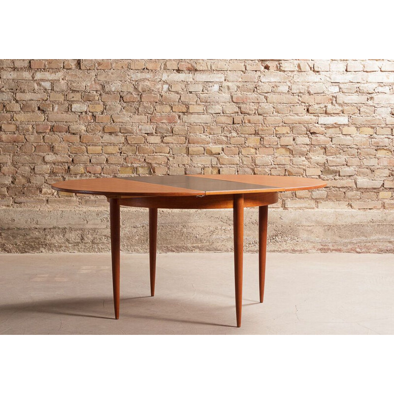 Vintage round teak table with black central extension
