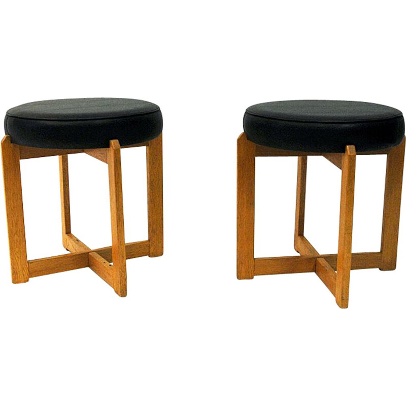 Pair of vintage oakwood and black leatherette stools, Sweden 1960