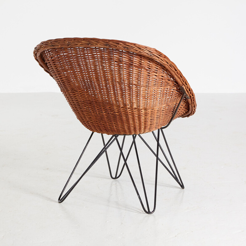 Vintage wicker garden armchair