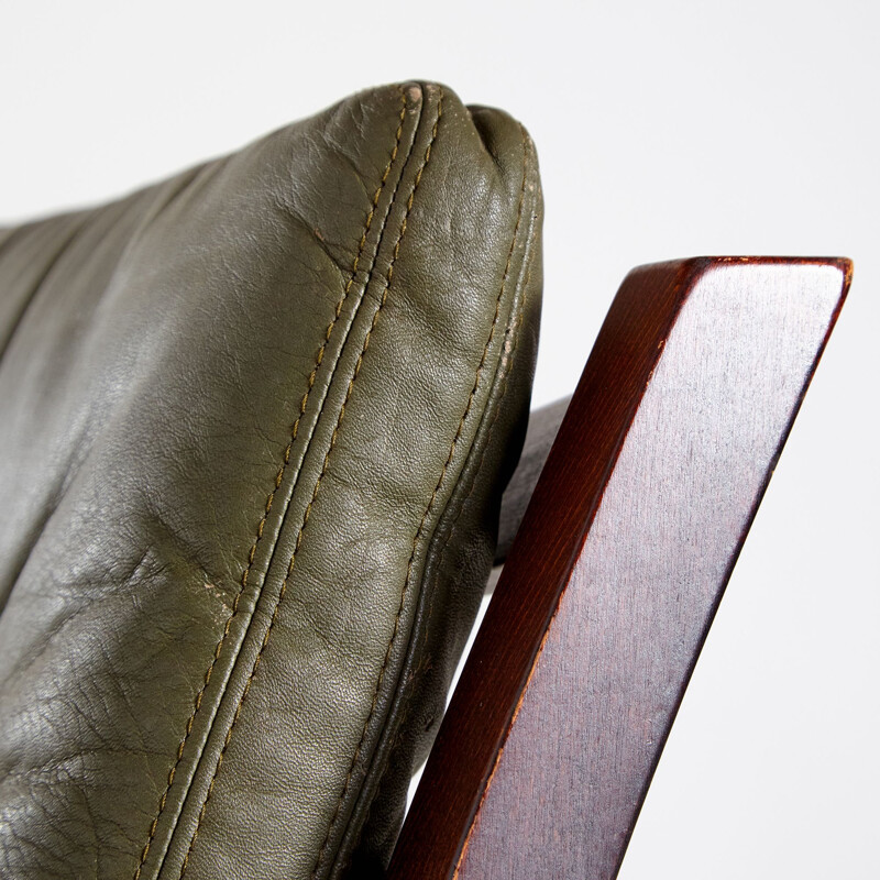 Vintage beech and leather armchair