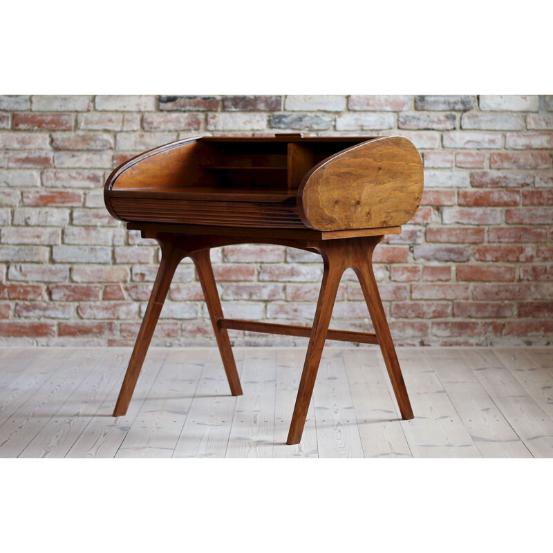 Vintage walnut veneer desk with castors, Poland 1950