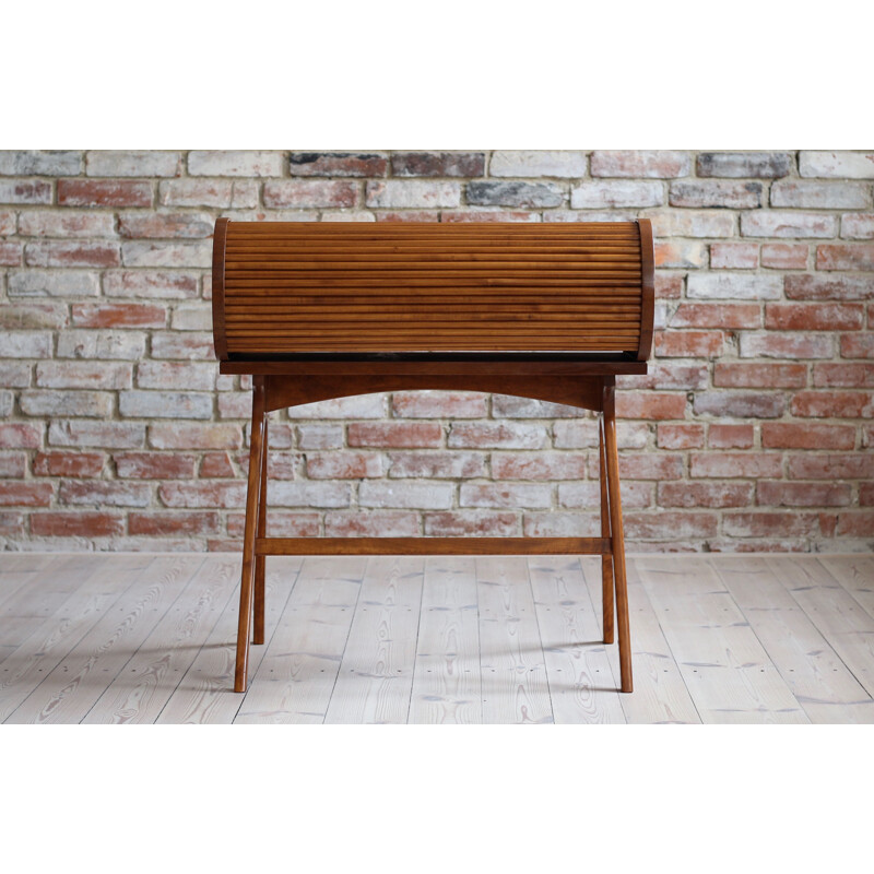 Vintage walnut veneer desk with castors, Poland 1950