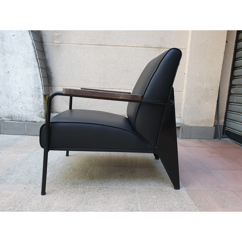 Mid century oakwood and black leather armchair by Jean Prouvé, 2019