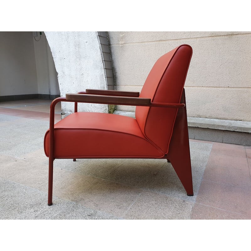 Vintage oakwood and red leather armchair by Jean Prouvé, 2019