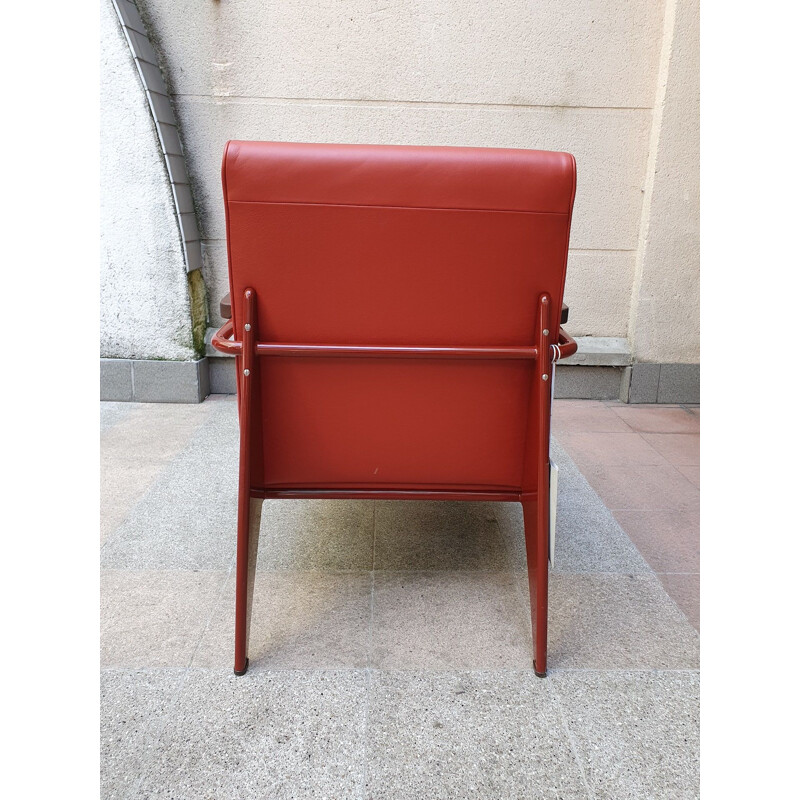 Vintage oakwood and red leather armchair by Jean Prouvé, 2019