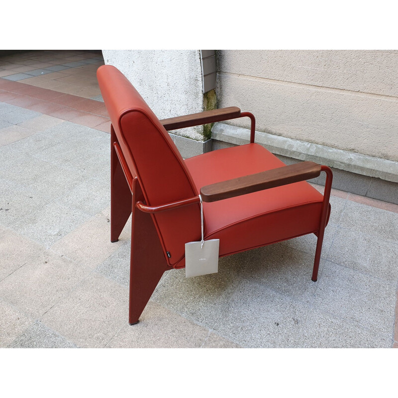 Vintage oakwood and red leather armchair by Jean Prouvé, 2019