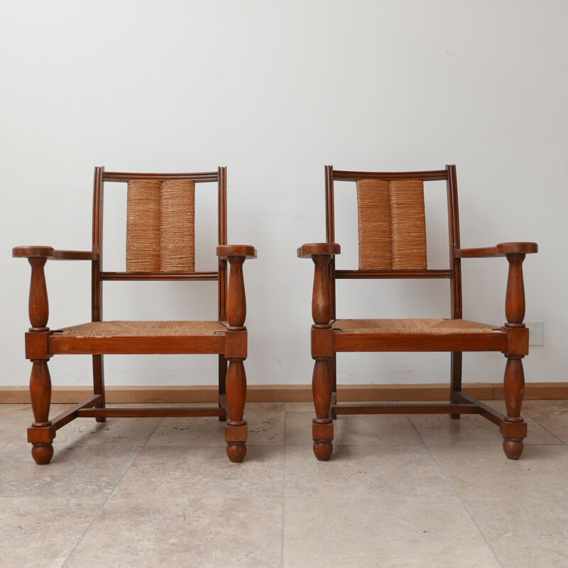 Pair of vintage armchairs in wood and rush, France 1950