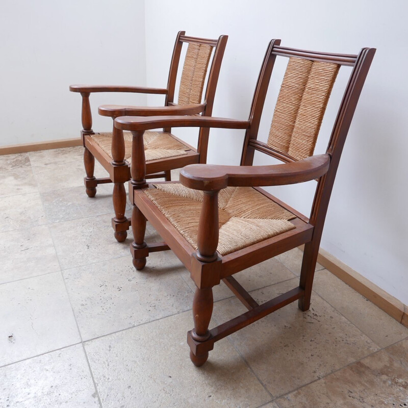 Pair of vintage armchairs in wood and rush, France 1950