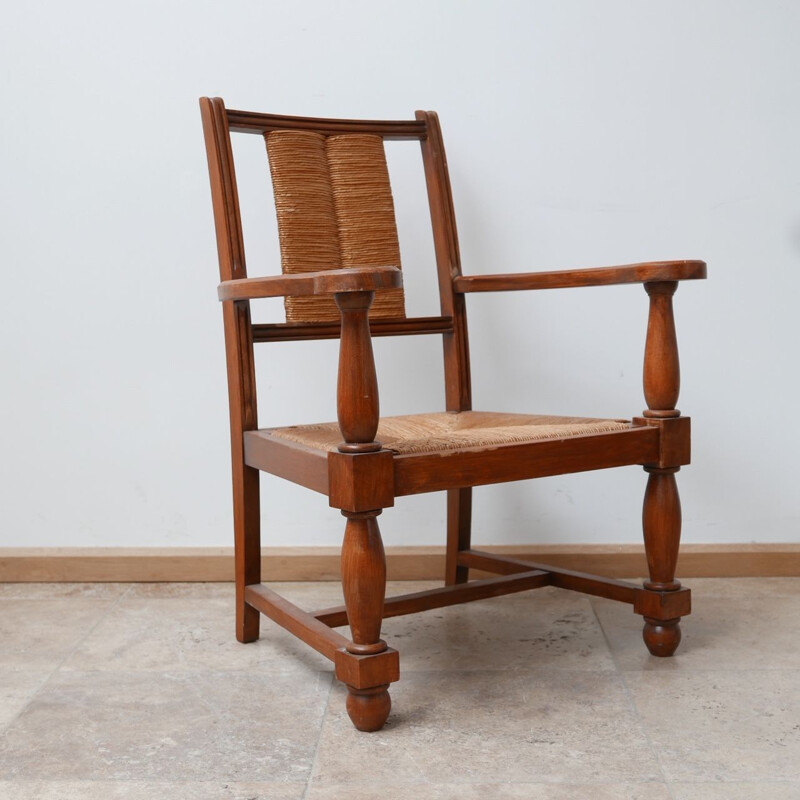 Pair of vintage armchairs in wood and rush, France 1950