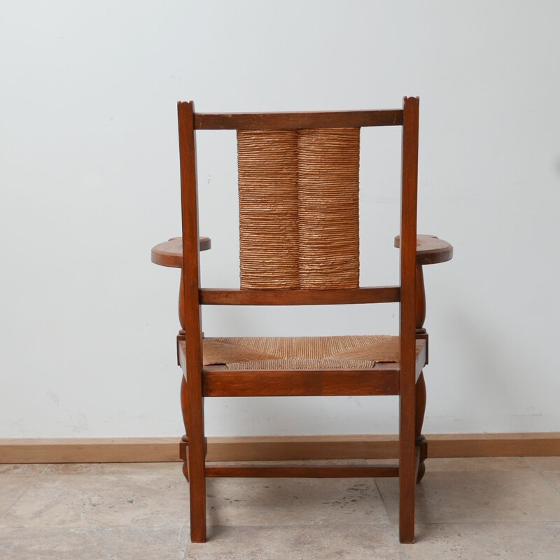 Pair of vintage armchairs in wood and rush, France 1950