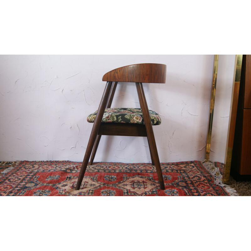 Vintage armchair with curved back