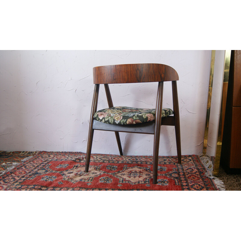 Vintage armchair with curved back