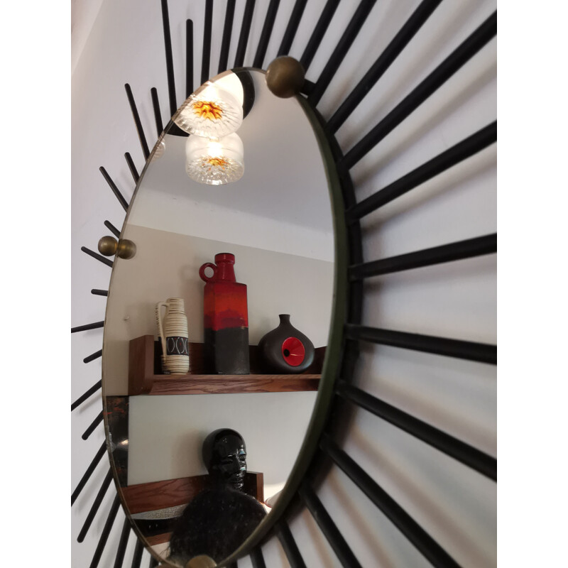 Mid century black iron sun mirror