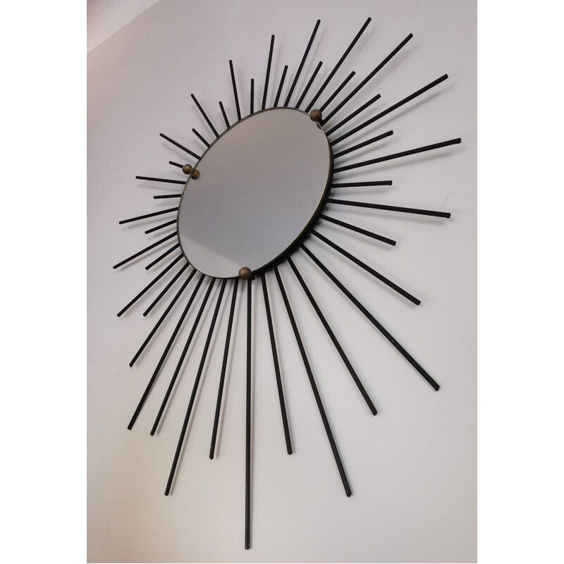 Mid century black iron sun mirror