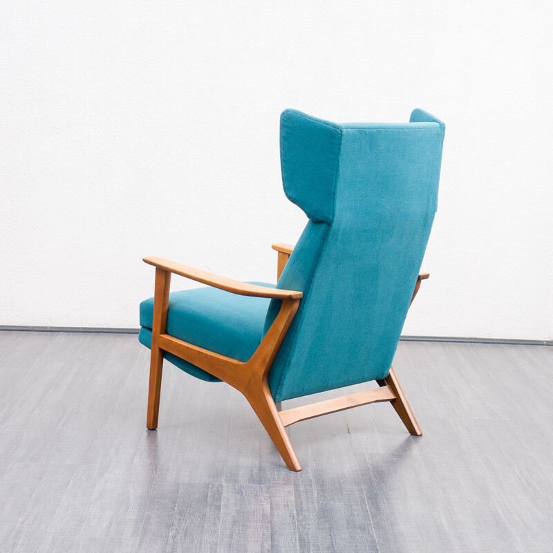 Vintage wing armchair with folding legs, 1960s