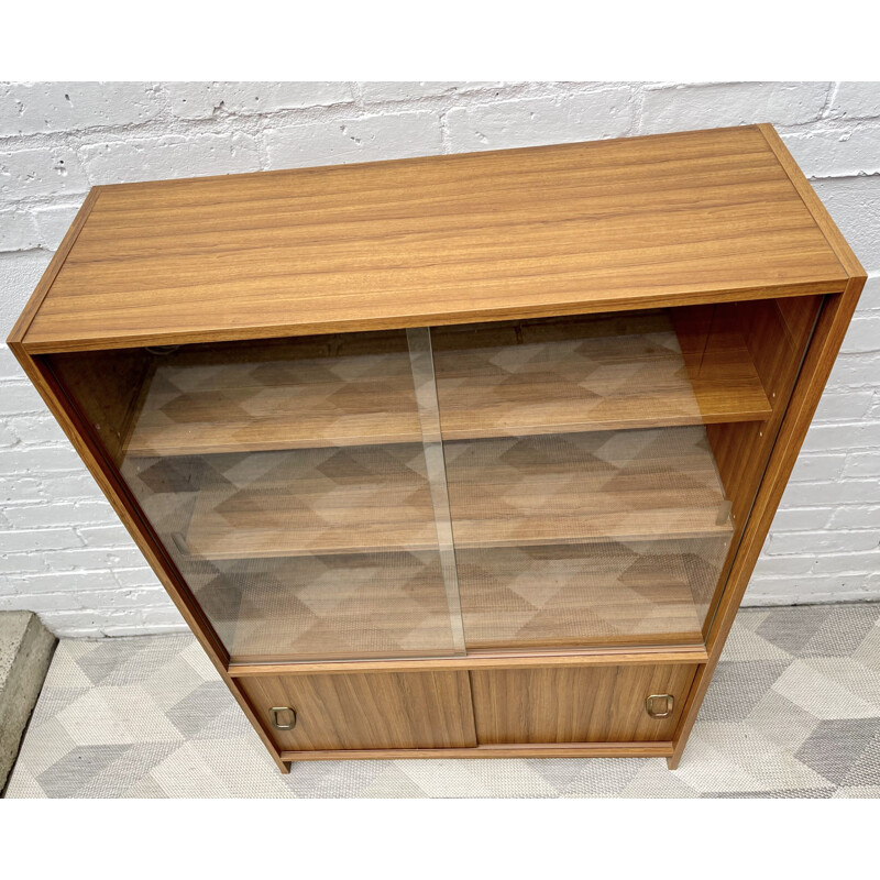 Vintage glass bookcase cupboard with sliding doors, 1970-1980