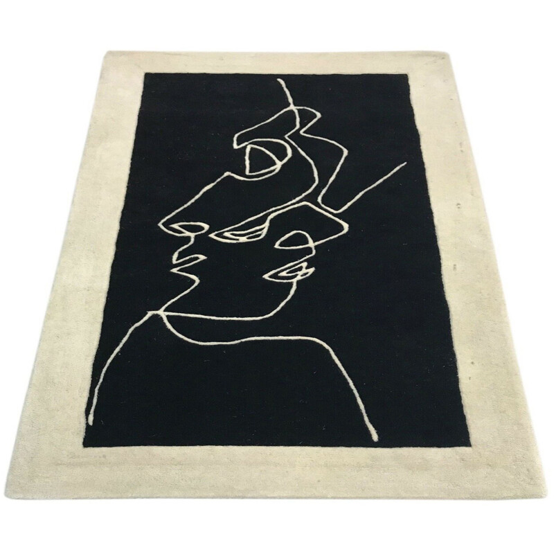 Vintage rug with surrealist wool pattern