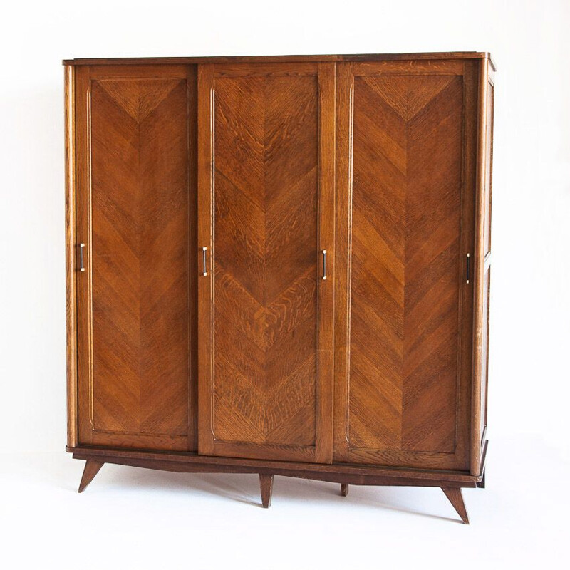 Vintage three-door sliding oak closet, France 1960