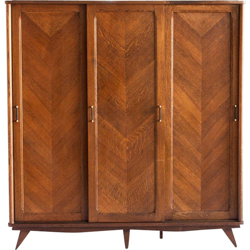 Vintage three-door sliding oak closet, France 1960