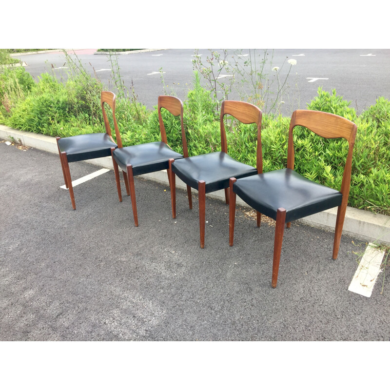 Set of 4 vintage teak and black skai chairs 1950