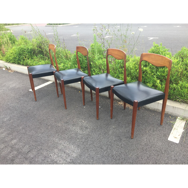 Set of 4 vintage teak and black skai chairs 1950