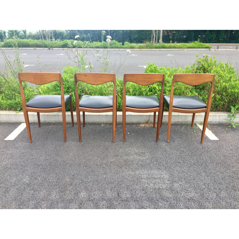 Set of 4 vintage teak and black skai chairs 1950