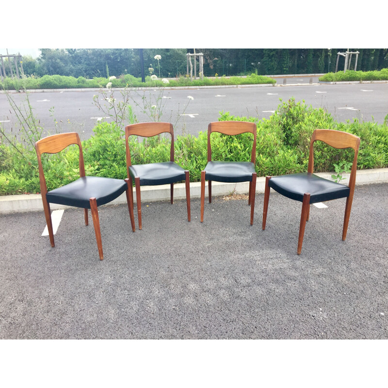 Set of 4 vintage teak and black skai chairs 1950