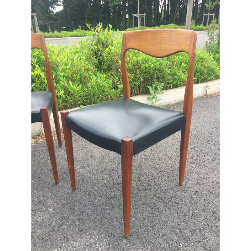 Set of 4 vintage teak and black skai chairs 1950