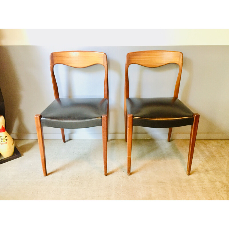 Set of 4 vintage teak and black skai chairs 1950