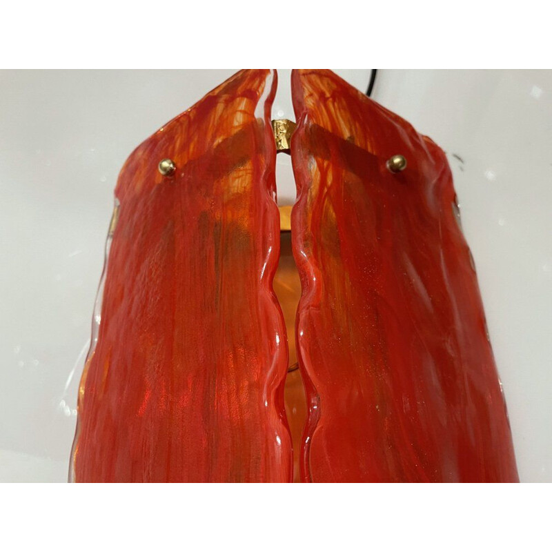 Paar vintage wandlampen in rood Murano glas