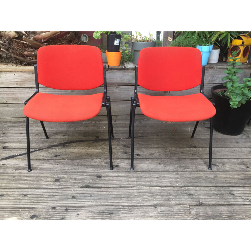 Pair of vintage Castelli coral red chairs