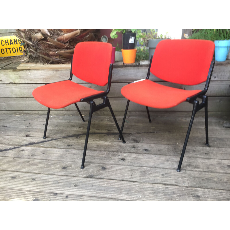 Pair of vintage Castelli coral red chairs
