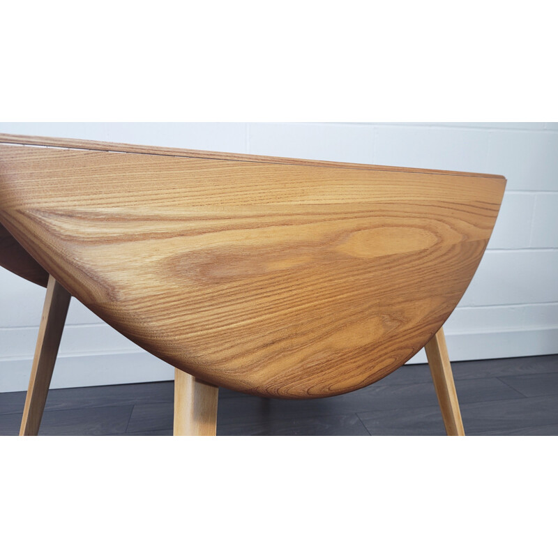 Vintage round table with flap by Ercol, 1960