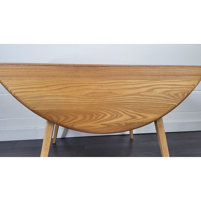 Vintage round table with flap by Ercol, 1960